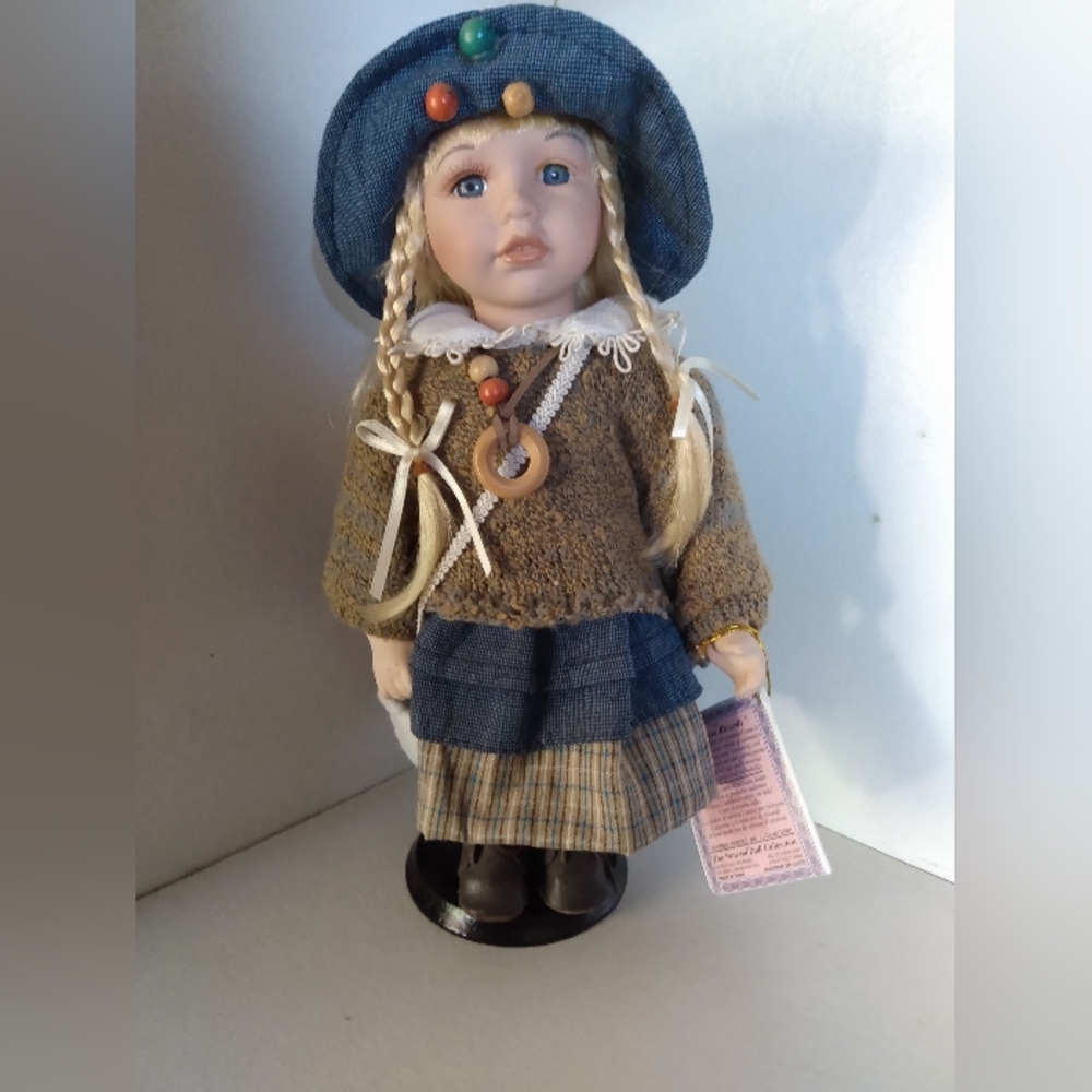 Charming Doll with Blue and Brown Outfit
